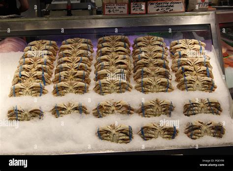Seafood Displayed At Pike Place Fish Co At Pike Place Market In