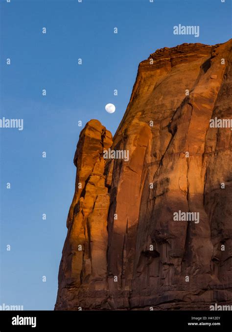 Moon Over Monument Valley Stock Photo Alamy