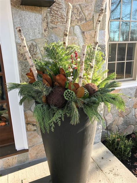 We did not find results for: Elegant holiday planter using fresh evergreen boughs ...