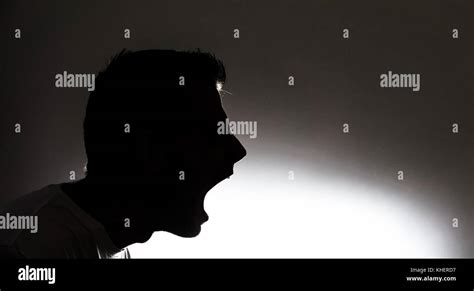 Screaming Silhouette Of A Man Stock Photo Alamy