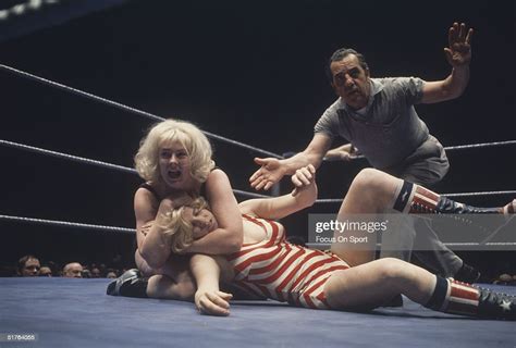 Women Wrestle While A Referee Makes The Countdown Circa 1970s Photo D
