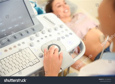Female Doctor Conducting Ultrasound Examination Woman Foto De Stock