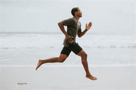 Premium Photo Black Man Running On The Beach