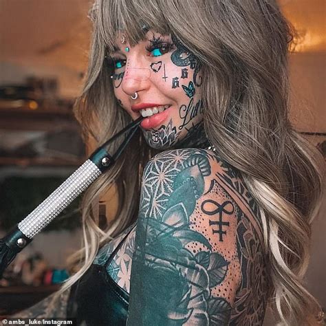 Amber Luke Who Has Spent 50k On 600 Tattoos Covers Them Up To See How She Looks Daily Mail Online