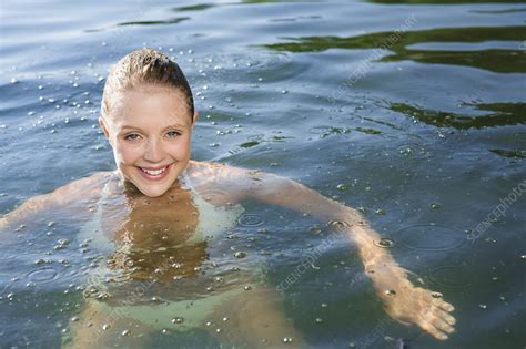 Smiling Woman Swimming In Lake Stock Image F006 6532 Science