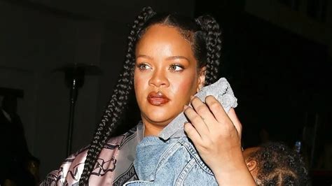 Rihanna Shows Off Blossoming Baby Bump As She Cradles Her Son Rza While
