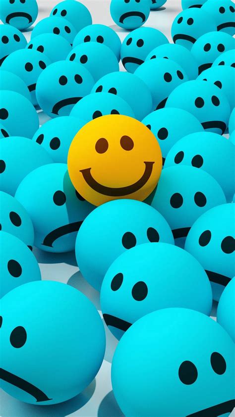 Download Smiley Face With Sad Face Balls Wallpaper