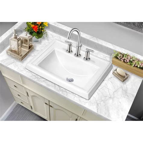 This sink is made from ceramic, which makes it sturdy and durable. Rectangular Drop-In Bathroom Sink with Faucet | Drop in bathroom sinks, Bathroom sink, Bathroom ...