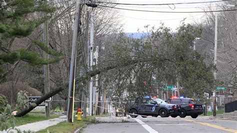 strong winds down trees knock power out to tens of thousands in area