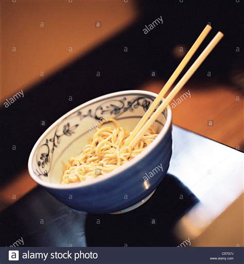 Though chopsticks are traditional eating implements in many asian cultures, the styles and uses of these dining tools are as diverse as the countries since then chopsticks have evolved into a daily utensil, used to eat many dishes in cuisines around asia. Chopsticks in bowl of noodles Stock Photo: 37660438 - Alamy
