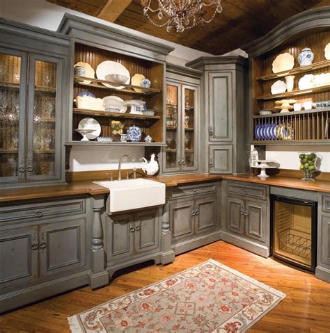 Love white kitchen cabinets glass doors dark wood floors. Kitchen Cabinets Ideas - HomesFeed