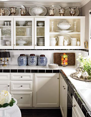 Add a little flavor to your small kitchen design with patterns. Decorating Above Kitchen Cabinets ~ Our Suburban Cottage