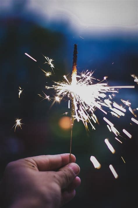 Person Holding Lighted Firecracker · Free Stock Photo