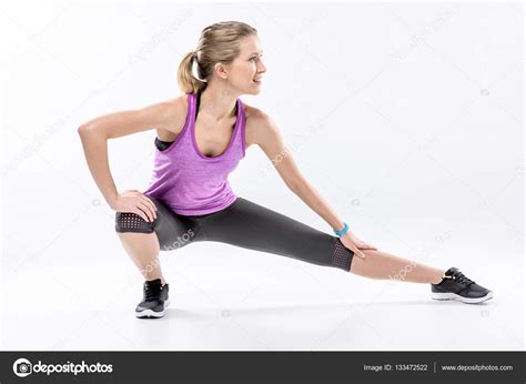 Sporty Woman Stretching — Stock Photo © Andrewlobov 133472522
