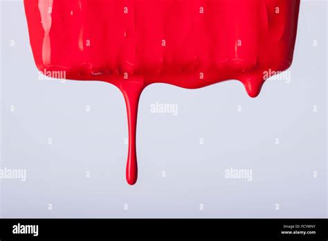 Dripping Paint In Red Stock Photo Alamy