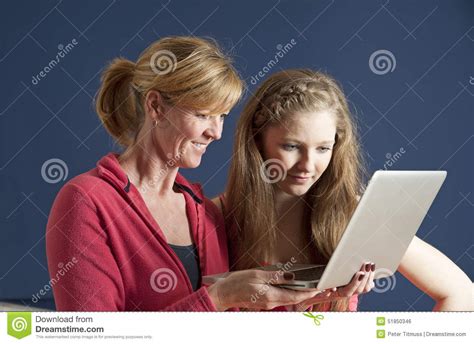 Couple Looking At A Laptop Computer Stock Photo Image Of Screen Families