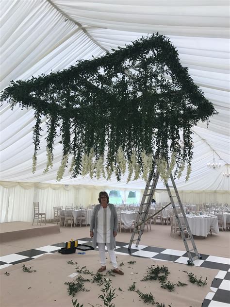 hanging flower ceiling over marquee dancefloor passion for flowers