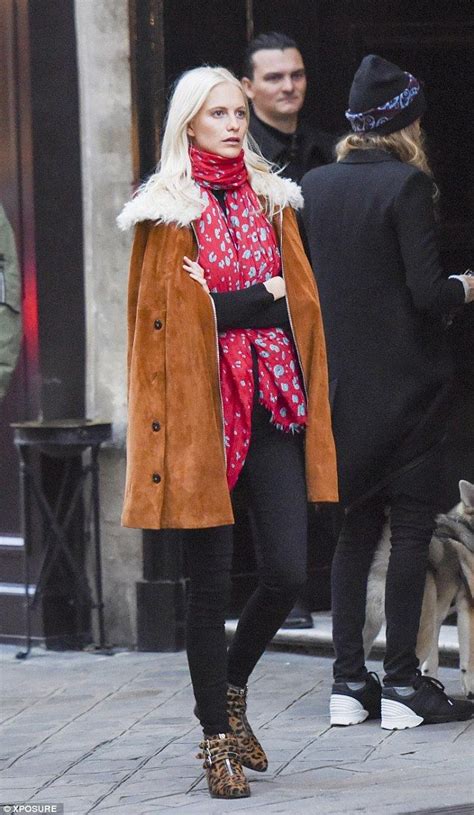 Cara Delevingne Flashes Her Incredibly Taut Tummy In Paris Poppy