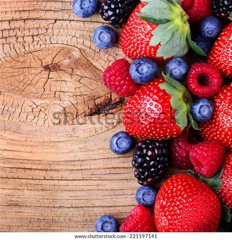 Berries On Wooden Background Strawberries Blueberry Stock Photo Edit