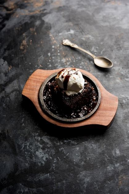Premium Photo Sizzling Chocolate Brownie Is A Sweet Dish Made Using