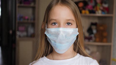 A Girl Wearing Mouth Mask Against Pandemic Protection Against Virus