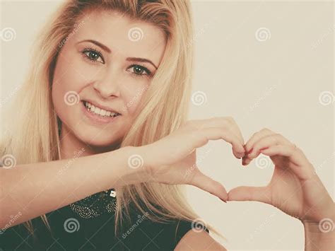 Blonde Woman Making Heart Symbol With Hands Stock Image Image Of Coquet Sign 98552579