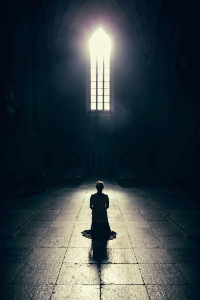 Kneeling In Prayer Stock Photos Pictures And Royalty Free Images Istock