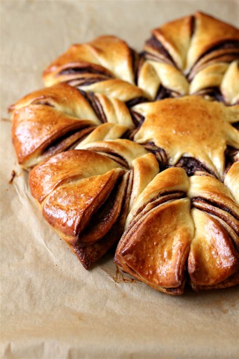 The legend has it that after death of christ, his disciples put bread meant for him on the table during their meals. Nutella Flower Bread | Ruchik Randhap