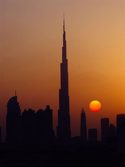 Uae Dubai Skyscrapers In Sunset Wallpaper Wallpaper