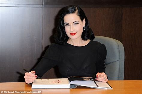 dita von teese shows off her hourglass figure in fifties style skirt daily mail online