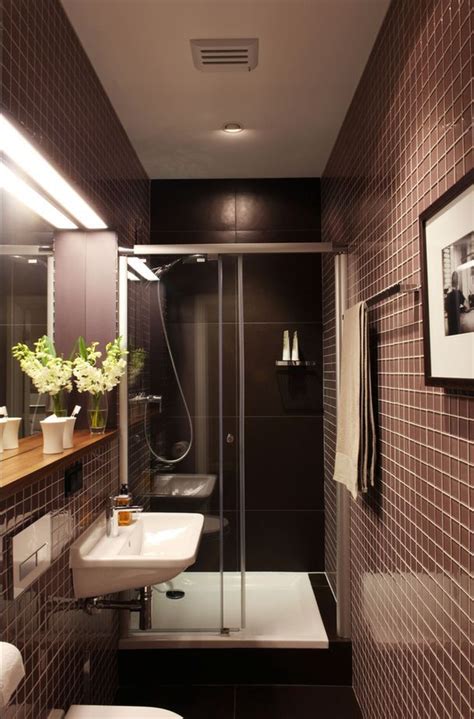 An oval bath cuts corners to boost the impression of space. narrow bathrooms | long narrow bathroom | Bathroom layout ...