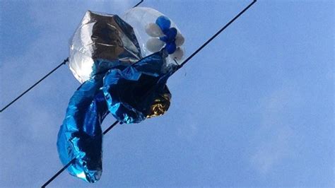 Manchester Helium Balloon Stuck In Cables Causes Train Delays Bbc News