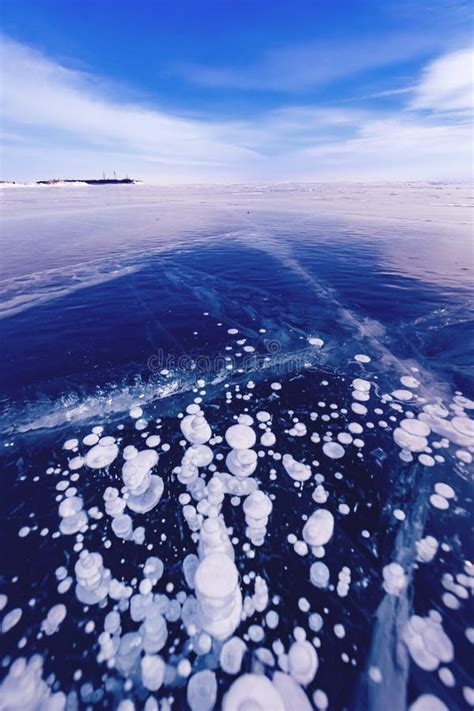 Gas Methane Bubbles Frozen In Winter Ice Of Lake Baikal Abstract