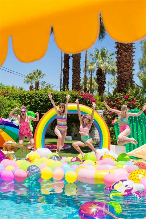 An Epic Rainbow Balloon Pool Party Pool Birthday Party Girls Pool