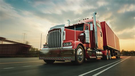 The Truck Runs On The Highway With Speed Stock Photo Download Image