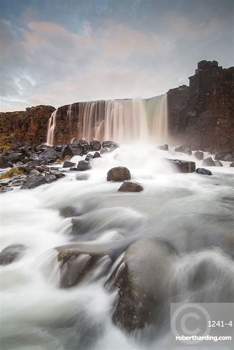 Oxarafoss Waterfall At Sunrise In Stock Photo