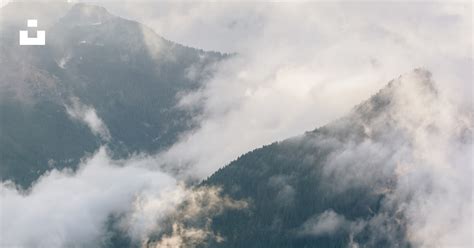 Mountains With Fogs During Daytime Photo Free Grey Image On Unsplash