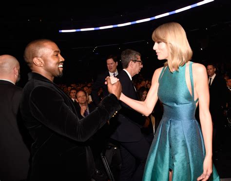 an incredible moment between taylor swift and kanye west at the grammys business insider