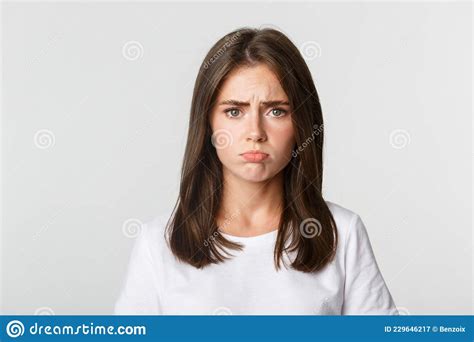 Close Up Of Sad Brunette Girl Sulking And Looking Upset Stock Image