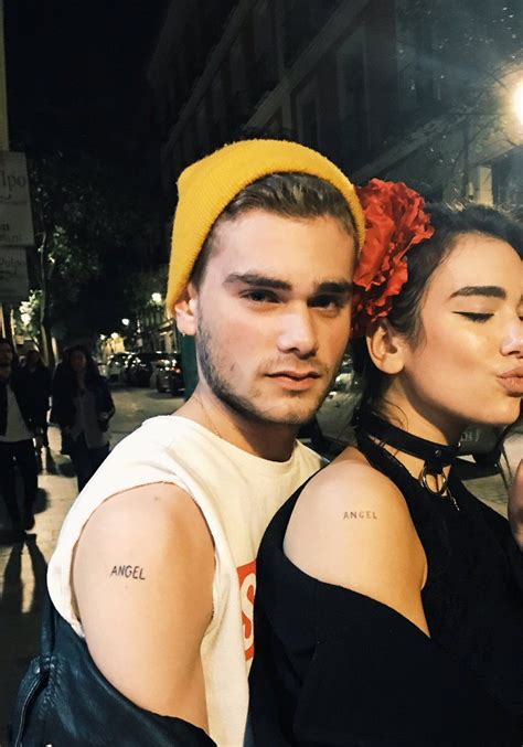 Dancing people future nostalgia this means nothing palm tree patience r and g barbed wire heart flame. Resultado de imagen de dua lipa tattoo angel | → TATTOOS ...