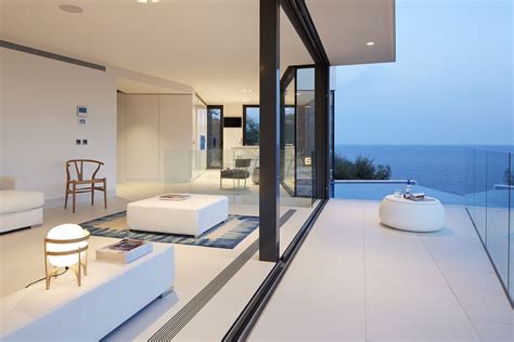 Modern Hillside Coastal Home In Spain With Magnificent