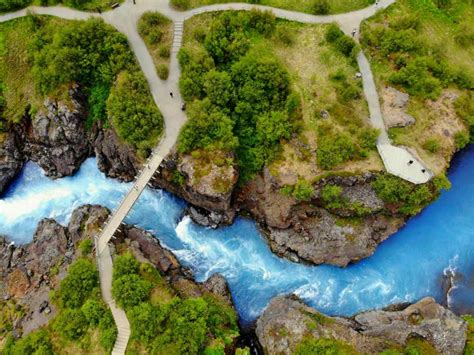 The Enchanting Hraunfossar And Barnafoss Waterfalls