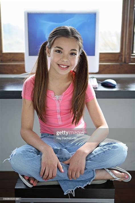 Girl Sitting On Chair Computer In Background Photo Getty Images