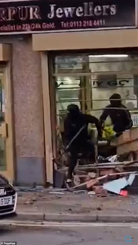 Moment Masked Robbers Armed With Sledgehammers Steal Thousands Of