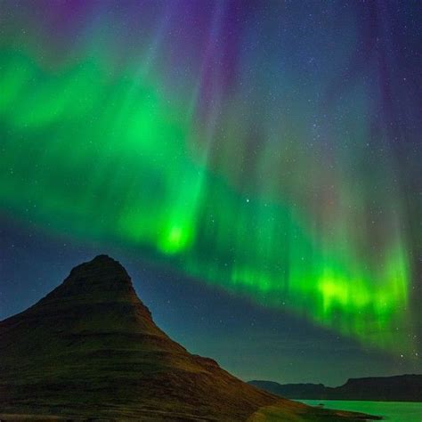 Glistening Aurora Borealis Over Kirkjufell Iceland Photography By