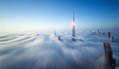 Heavenly Photographs Of Dubai Skyscrapers Poking Through A Sea Of Clouds