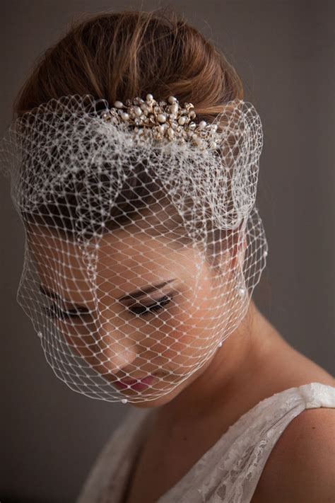 Bridal collection white birdcage veil with flower on hair clip. 20 Wedding Hairstyles with Birdcage Ideas - Wohh Wedding