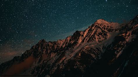 Download Wallpaper 1366x768 Mountains Starry Sky Night Tablet Laptop