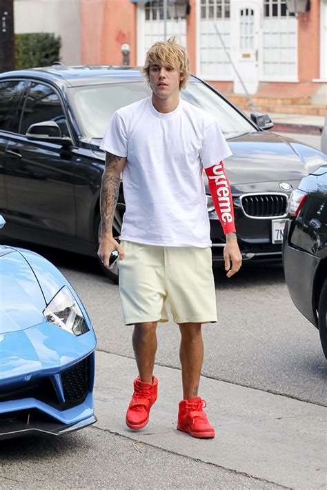 Justin Bieber Wears Kanye Wests Red October Sneakers At Gym — Pics