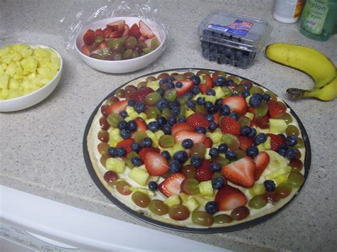 A pillsbury™ sugar cookie base gets topped with a melted caramel layer, followed by sweetened cream cheese with chopped reese's™ peanut butter cups™ miniatures, and finished with chocolate. Fruit Pizza: 16oz Pillsbury Sugar Cookie Dough 8oz ...